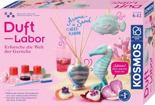 Auf dem Bild ist ein Duft-Labor-Set von Kosmos für Kinder im Alter von 8 bis 12 Jahren zu sehen. Das Set enthält verschiedene Fläschchen, einen Herzflakon und Figuren wie einen Fisch und ein Seepferdchen.