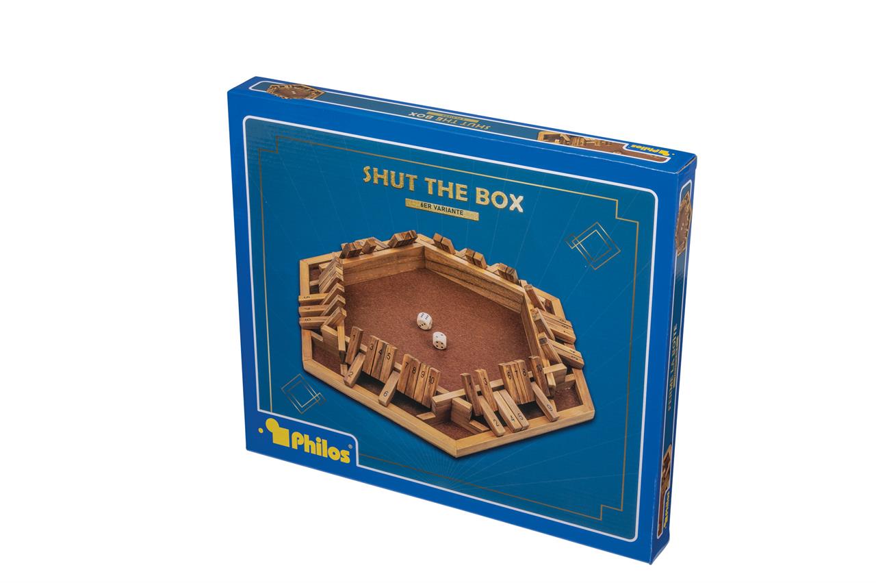 Auf dem Bild ist die Verpackung des Spiels "Shut the Box, 10er, 6er Variante" zu sehen. Die Schachtel ist blau und zeigt ein hölzernes Spielbrett mit Würfeln.