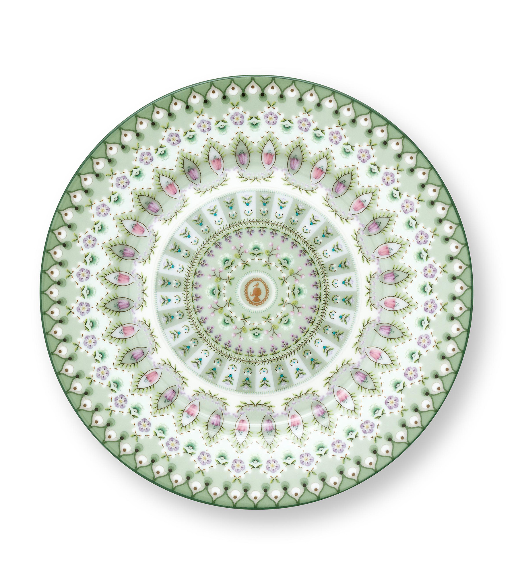 Auf dem Bild ist der Teller „Lily & Lotus“, Moon Delight in Hellgrün zu sehen. Der Teller hat ein schönes, rundes Design.