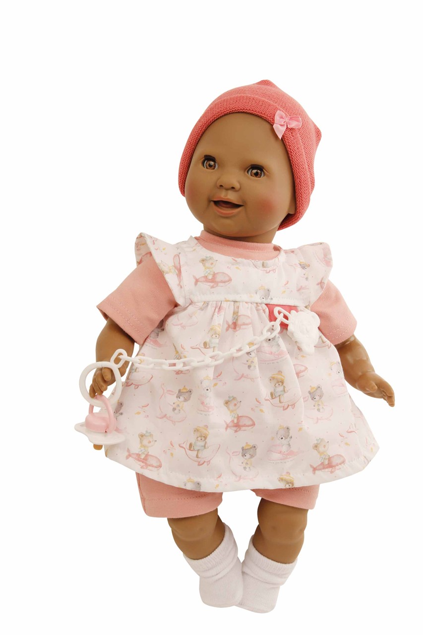 Das Bild zeigt das Produkt Schnullerbaby schwarz Lenchen 37 cm Malhaar. Die Puppe hat braune Schlafaugen und trägt Kleidung mit Walfisch-Motiv.