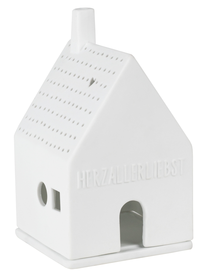 Auf dem Bild ist ein kleines, weißes Lichthaus aus Keramik zu sehen. Auf der Vorderseite steht das Wort „HERZALLERLIEBST“ eingeprägt.