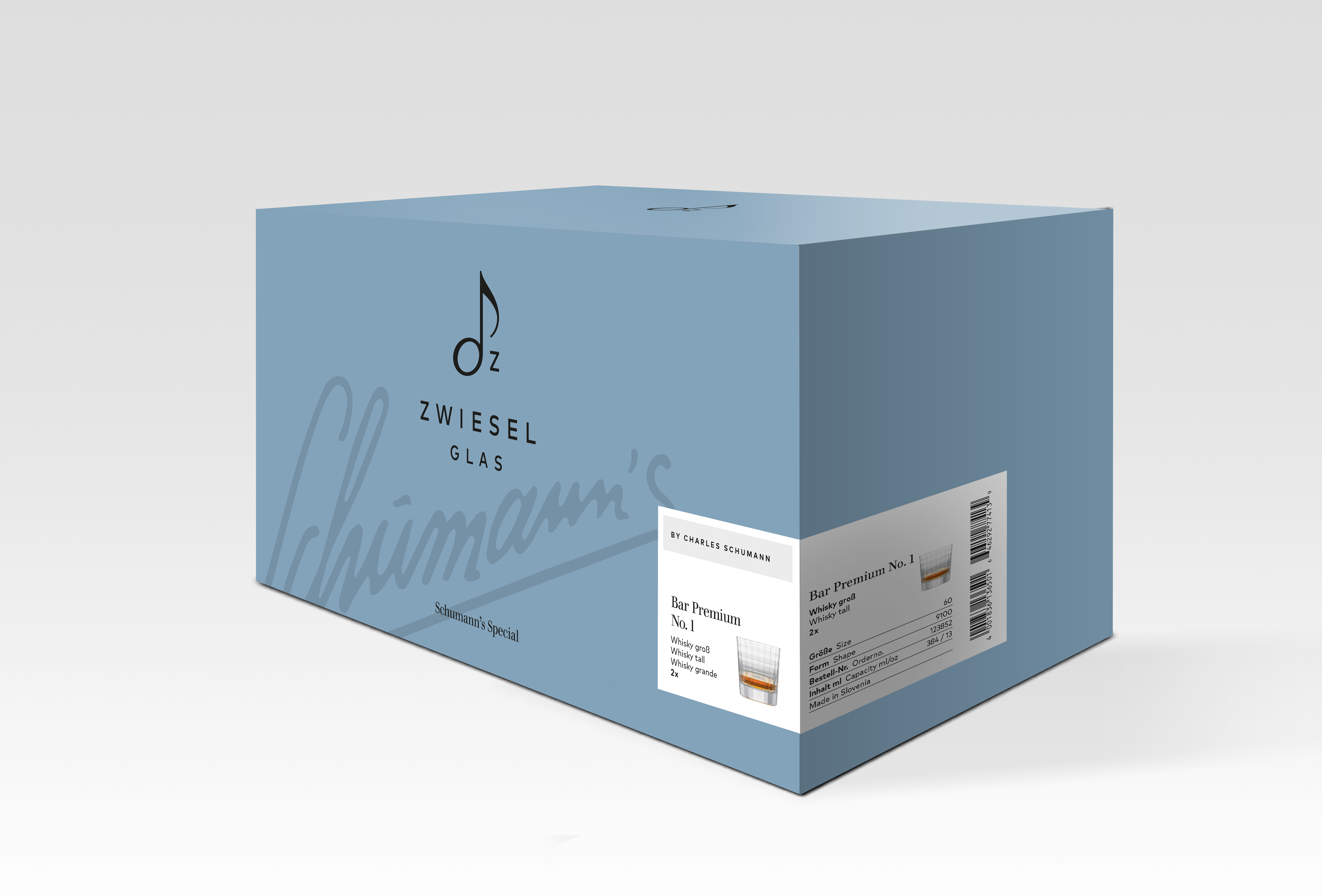 Auf dem Bild ist ein großer, hellblauer Karton mit der Aufschrift "Zwiesel Glas Schumann’s Special" zu sehen. Auf der Seite des Kartons befindet sich ein Etikett mit der Bezeichnung "Bar Premium No.1" und einer Abbildung eines Whiskyglases.
