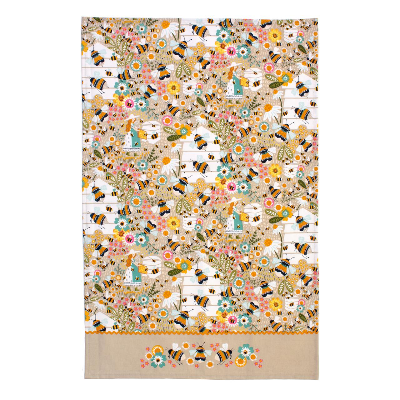 Das Bild zeigt ein Geschirrtuch mit buntem Bienen- und Blumenmuster. Das Tuch besteht aus 100% Baumwolle und trägt den Namen "Bee Keeper".