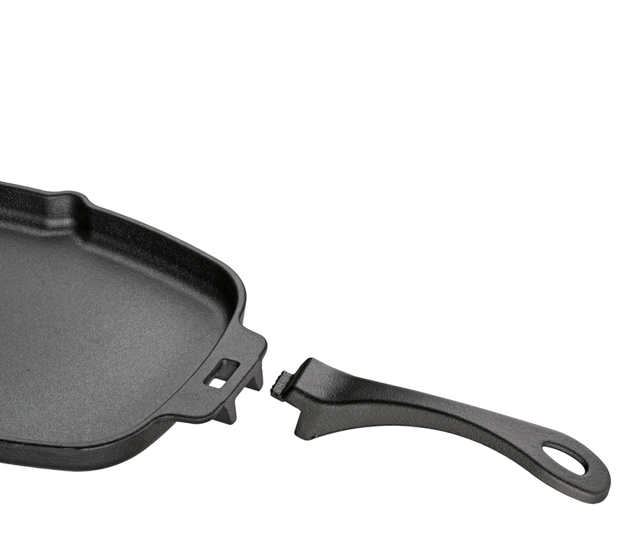 Das Bild zeigt eine schwarze Bratpfanne mit abnehmbarem Griff. Der Griff liegt separat neben der Pfanne.