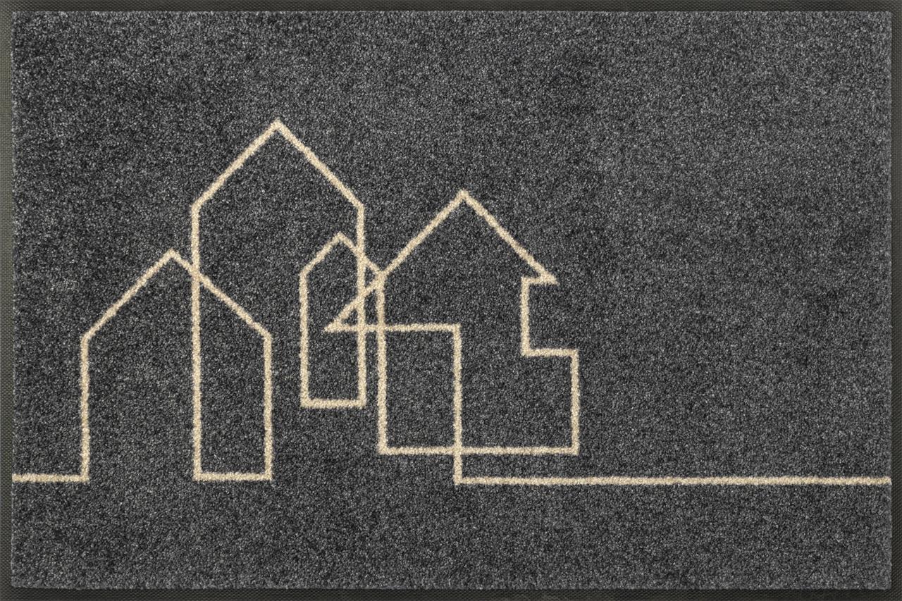 Dies ist eine dunkelgraue Fußmatte mit einem einfachen Linienmuster, das Häuser darstellt. Das Produkt heißt "w+d Design Linestreet" und hat die Maße 50x75 cm.