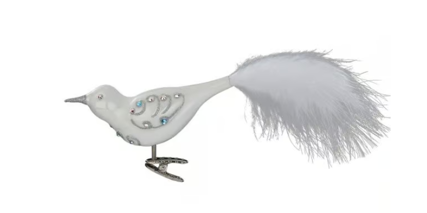 Das Produkt heißt Prächtiges Gefieder und ist 11,5 cm groß. Es zeigt einen farbenfrohen Vogel mit auffälligem Gefieder.