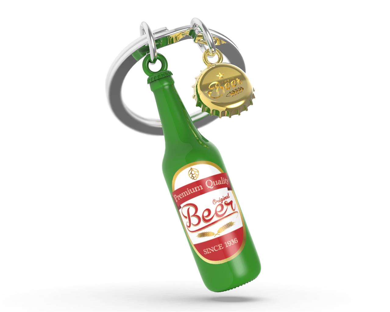Der Schlüsselanhänger „Bottom Up“ zeigt eine grüne Bierflasche als Anhänger. Zusätzlich hängt ein goldener Kronkorken am Schlüsselring.