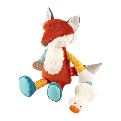 Auf dem Bild ist ein Plüschfuchs mit bunten Beinen und großen Ohren zu sehen. An einem Arm hält der Fuchs ein weißes Stofftier in Form einer Ente.