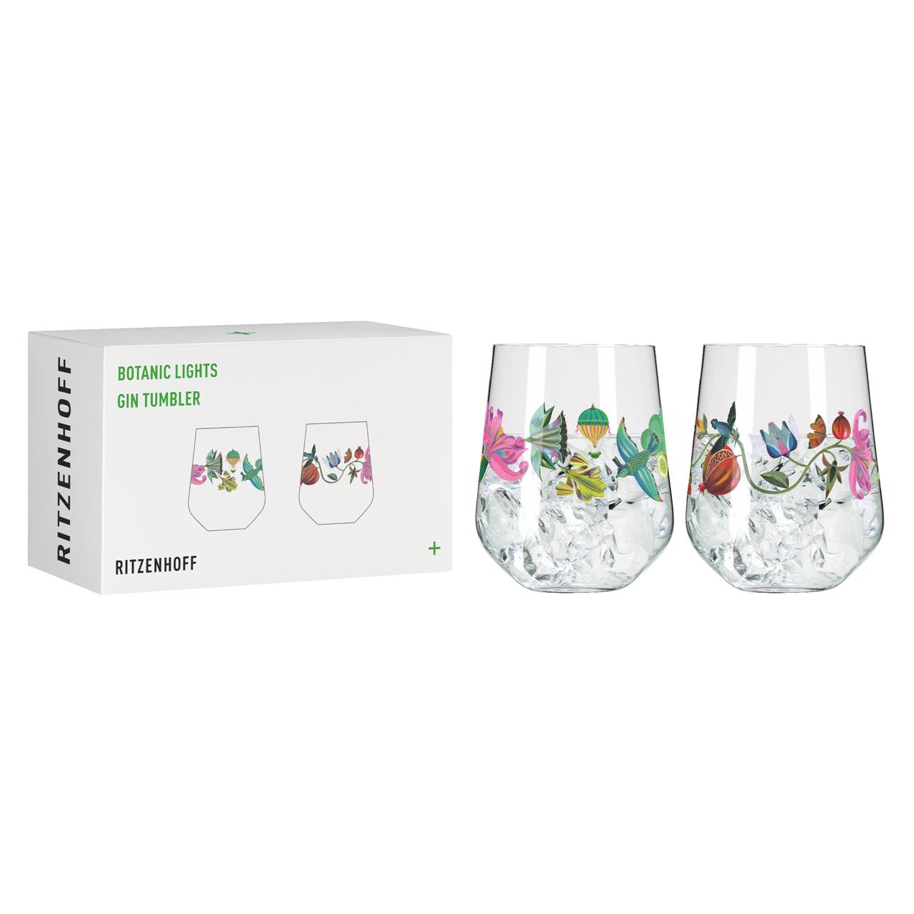 Auf dem Bild sind zwei Gin-Gläser mit buntem botanischem Motiv zu sehen. Daneben steht die Verpackung mit der Aufschrift „Botanic Lights Gin Tumbler“ von Ritzenhoff.