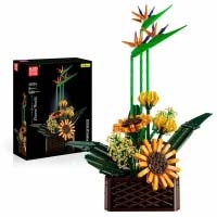 Auf dem Bild ist das Produkt "Mould King® 10024 Strelitzien" zu sehen. Es zeigt ein farbenfrohes Blumenarrangement aus Bausteinen neben der dazugehörigen Verpackung.