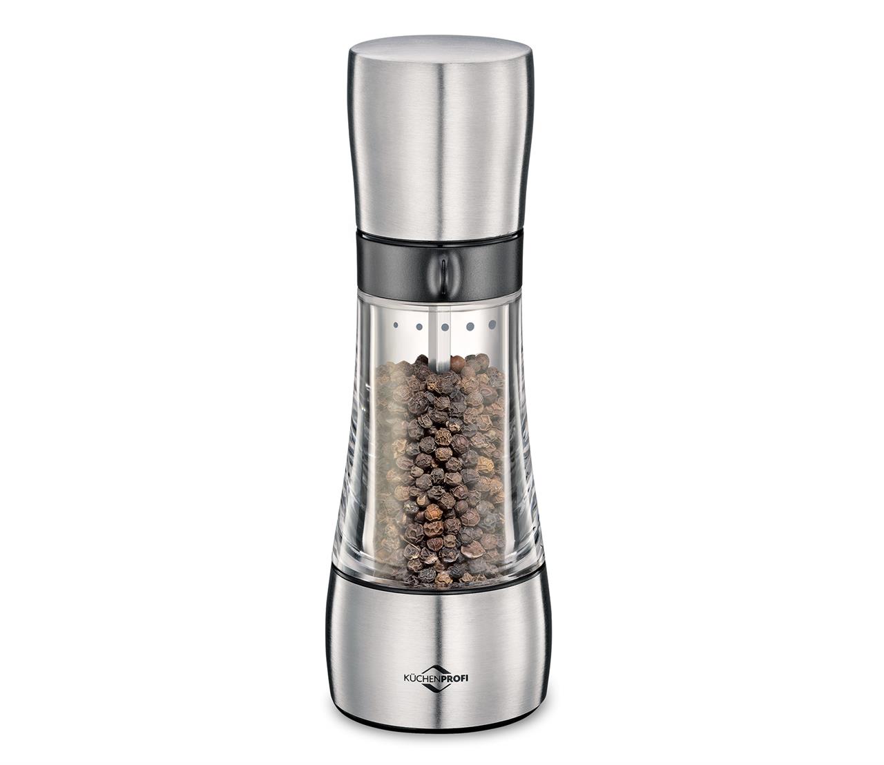 Die Abbildung zeigt die Pfeffermühle ORLANDO mit einem eleganten Design aus Edelstahl und Glas. Sie ist mit schwarzen Pfefferkörnern gefüllt und eignet sich ideal zum frischen Mahlen von Pfeffer.