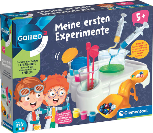 Auf dem Bild ist ein Experimentierkasten für Kinder ab 5 Jahren mit dem Titel „Meine ersten Experimente“ zu sehen. Die Verpackung zeigt verschiedene Laborutensilien und zwei fröhliche Kinder im Wissenschaftler-Outfit.