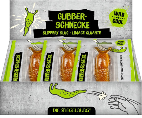 Das Bild zeigt eine Packung mit mehreren glitschigen Spielzeugschnecken namens "Glibber-Schnecke". Die Verpackung ist bunt gestaltet und stammt von der Marke Die Spiegelburg.