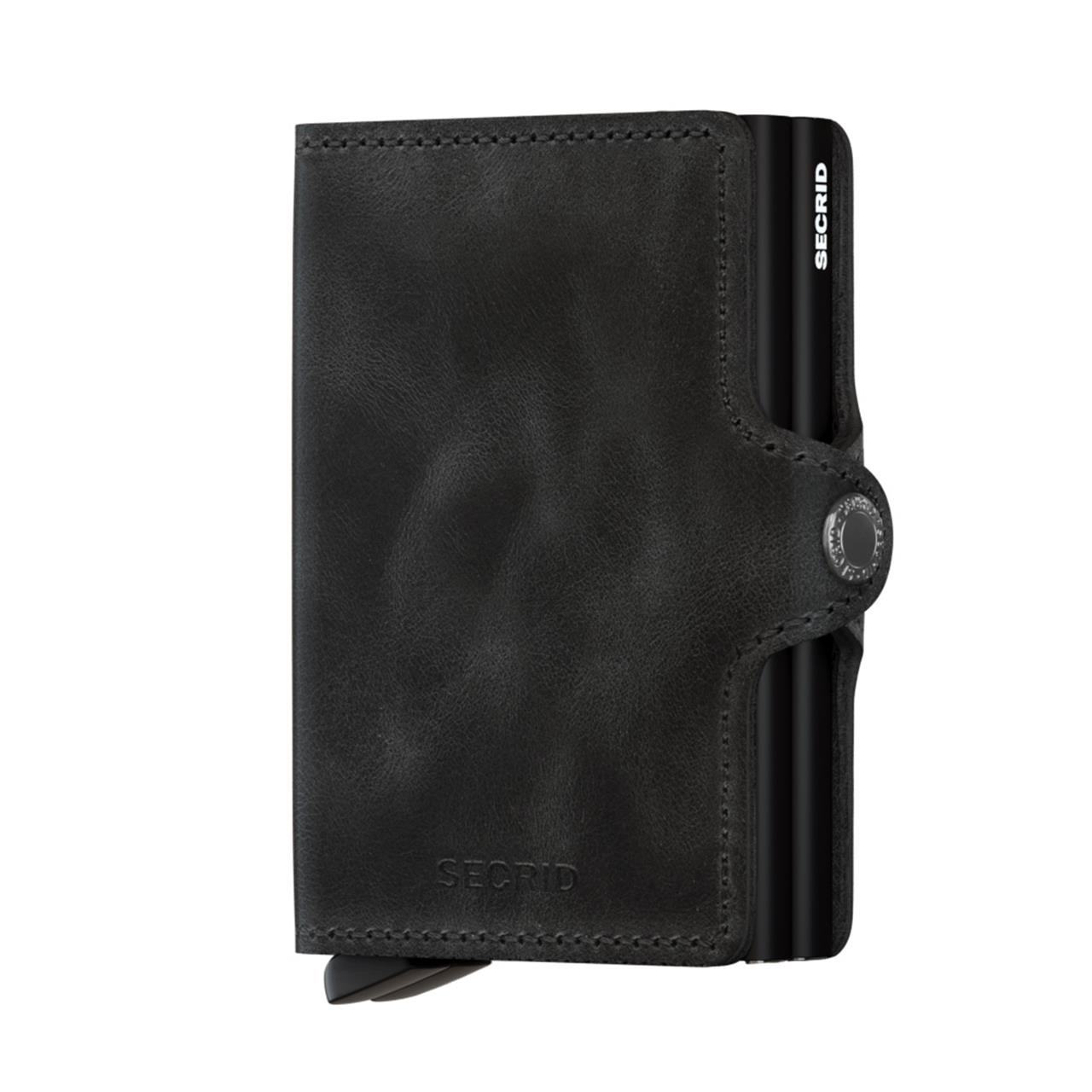 Das Bild zeigt ein schwarzes Twinwallet aus Leder mit einem eleganten und schlichten Design. Auf der rechten Seite ist das Logo "SECRID" zu sehen.
