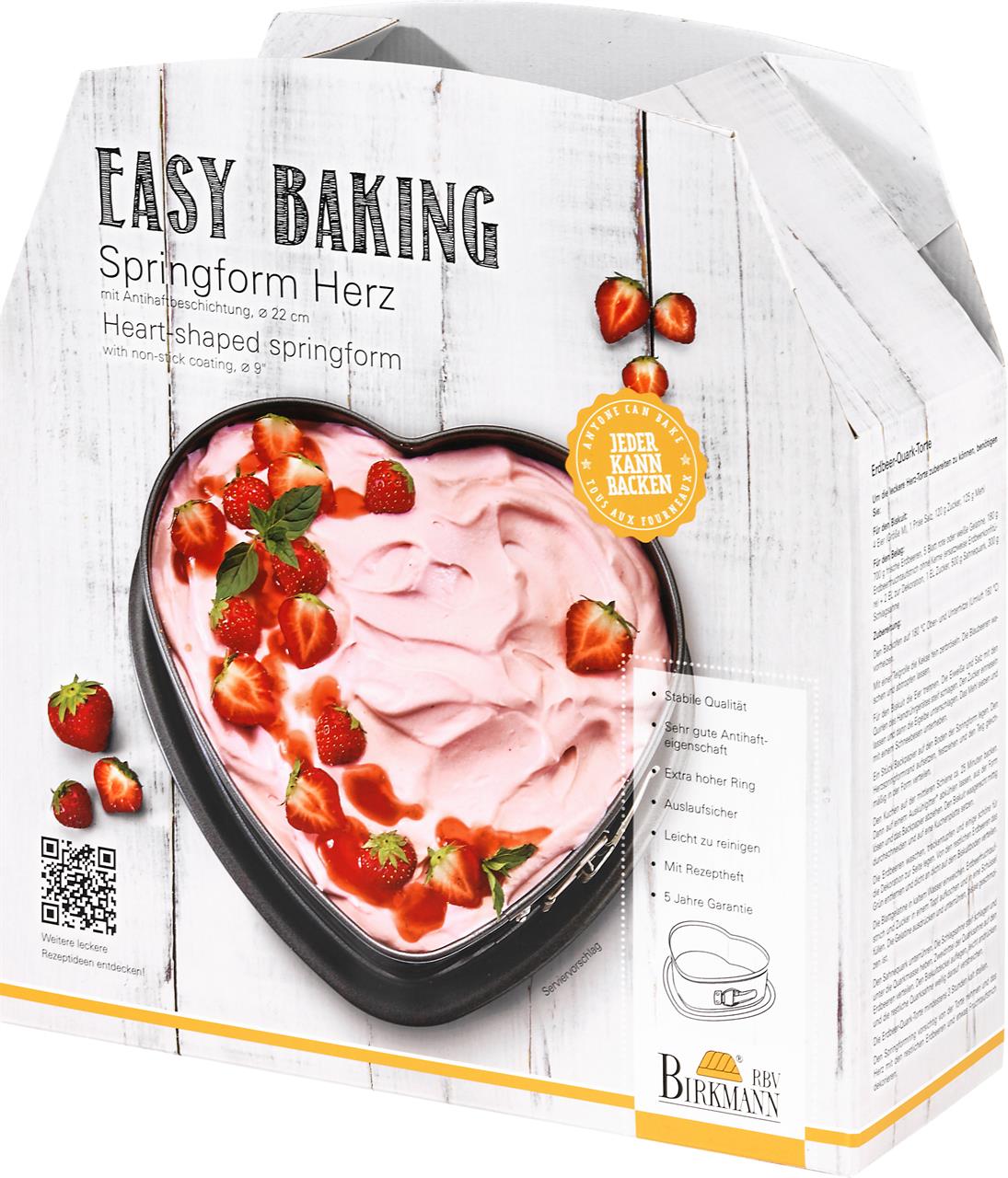 Diese Verpackung zeigt die Herz-Springform "Easy Baking" mit einem Durchmesser von 22 cm. Auf dem Bild ist eine Herztorte mit Erdbeeren abgebildet.