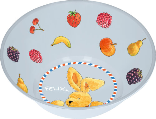 Auf dem Bild ist eine hellblaue Schale mit bunten Obstmotiven und einem Hasen in der Mitte zu sehen. In der Schale steht der Name "Felix" neben dem Hasen.