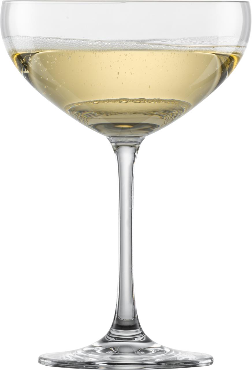 Das Bild zeigt ein Sektglas der Produktreihe "4er Sektschale Bar Special 8". Das Glas ist mit sprudelndem Sekt gefüllt.