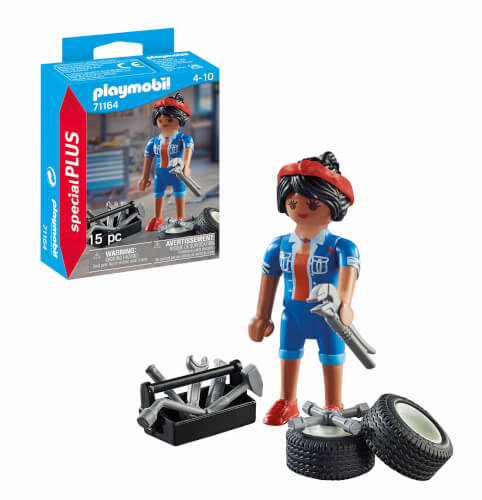 Das Bild zeigt eine Playmobil-Figur als Mechanikerin mit Werkzeug und Autoreifen. Im Hintergrund ist die dazugehörige Verpackung mit der Aufschrift „special PLUS“ zu sehen.