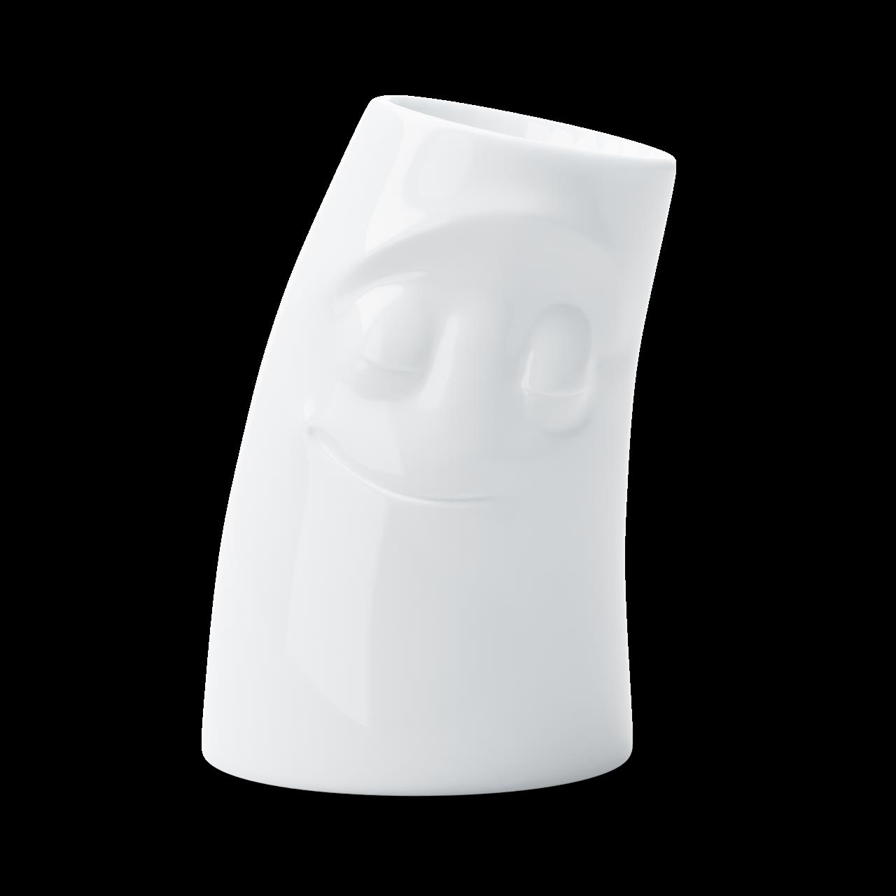 Das Bild zeigt das Produkt "Kerzenschmusie Verschmust". Es ist ein weißer Kerzenhalter mit einem verschmusten, lächelnden Gesicht.