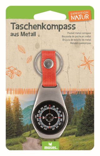 Auf dem Bild ist ein Taschenkompass aus Metall mit rotem Band zu sehen. Die Verpackung zeigt außerdem eine Waldlandschaft und enthält den Schriftzug „Expedition Natur“.