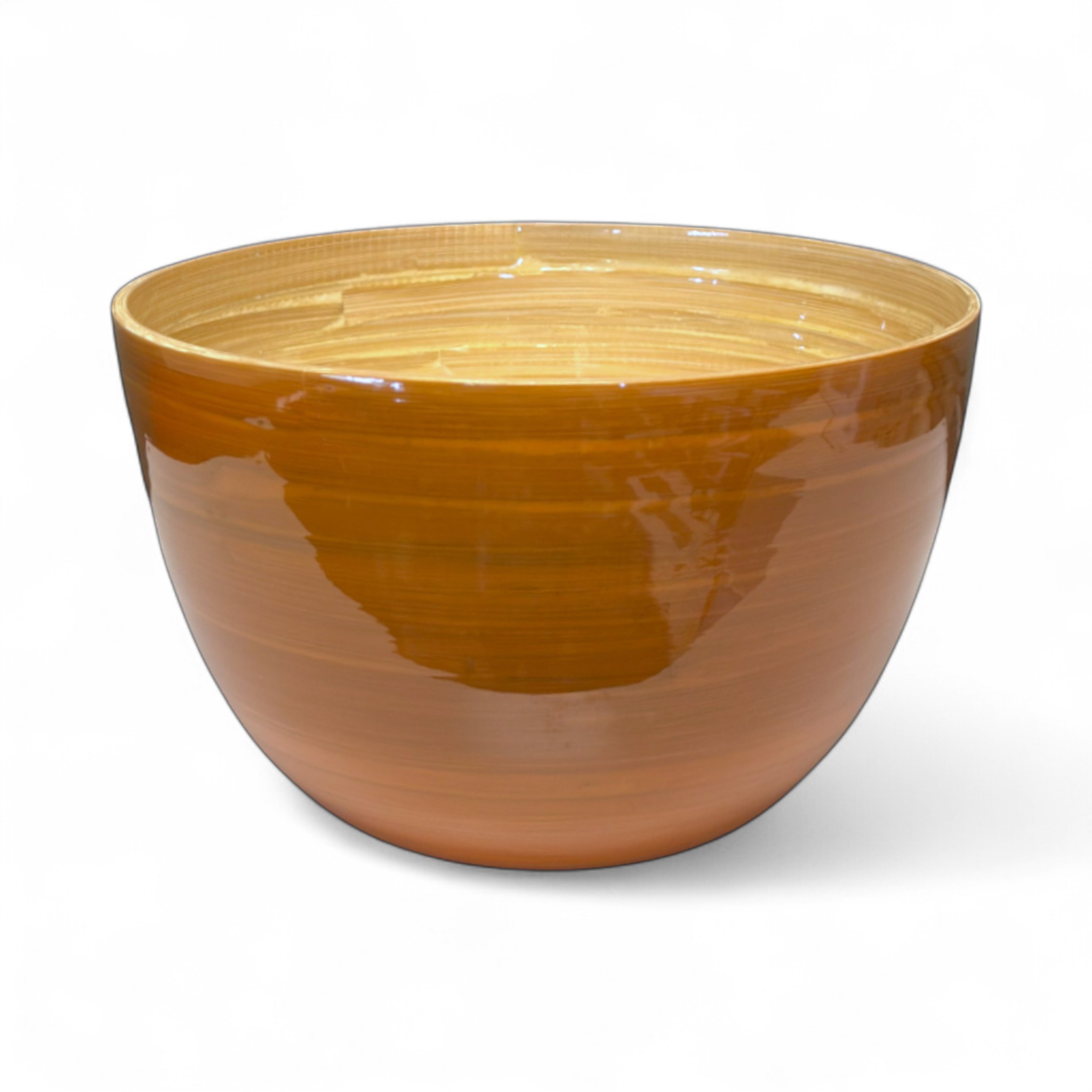 Zu sehen ist eine Bambus-Schüssel mit den Abmessungen 26x16 cm in Karamell. Sie kann vielfältig für Speisen oder als Obstschale verwendet werden.