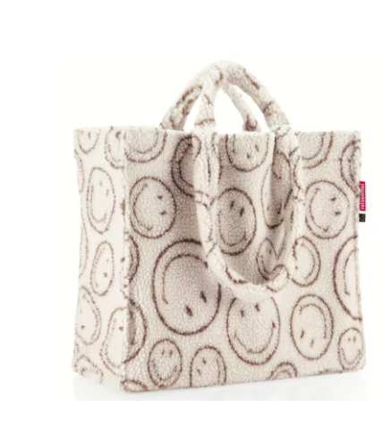 Hier ist die softshopper smiley® teddy chocolate Einkaufstasche zu sehen. Die Tasche ist weich und zeigt ein Smiley-Design.