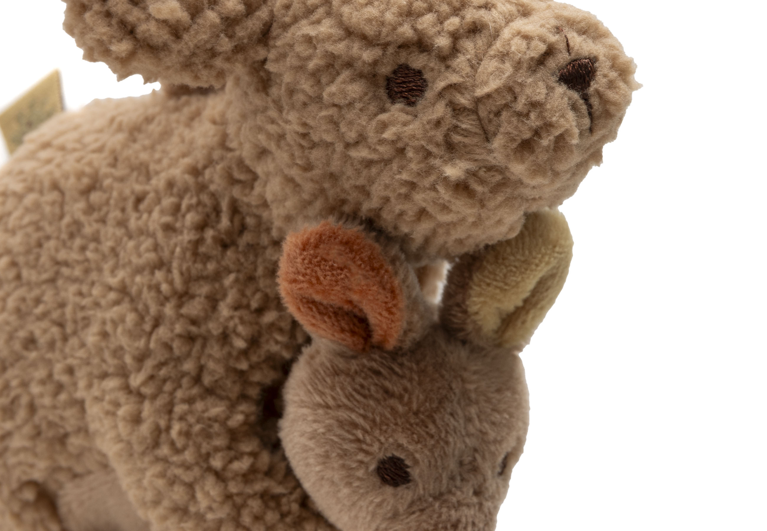 Das Bild zeigt ein weiteres Detail des Kinderwagen-Anhängers Kangaroots. Der Anhänger fördert die Motorik von Babys beim Spielen.