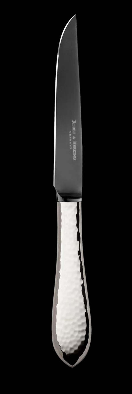 Das Bild zeigt das Martelé 150 Steakmesser Frozen Black. Es handelt sich um ein hochwertiges Steakmesser mit modernem Design.