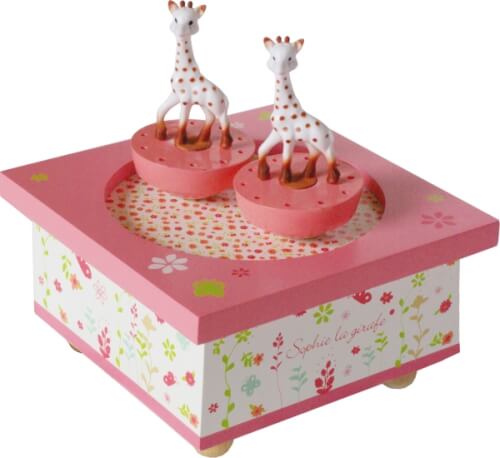 Auf dem Bild ist eine rosa Spieluhr mit zwei Giraffenfiguren zu sehen. Die Seiten der Spieluhr sind mit bunten Blumen und Mustern verziert.