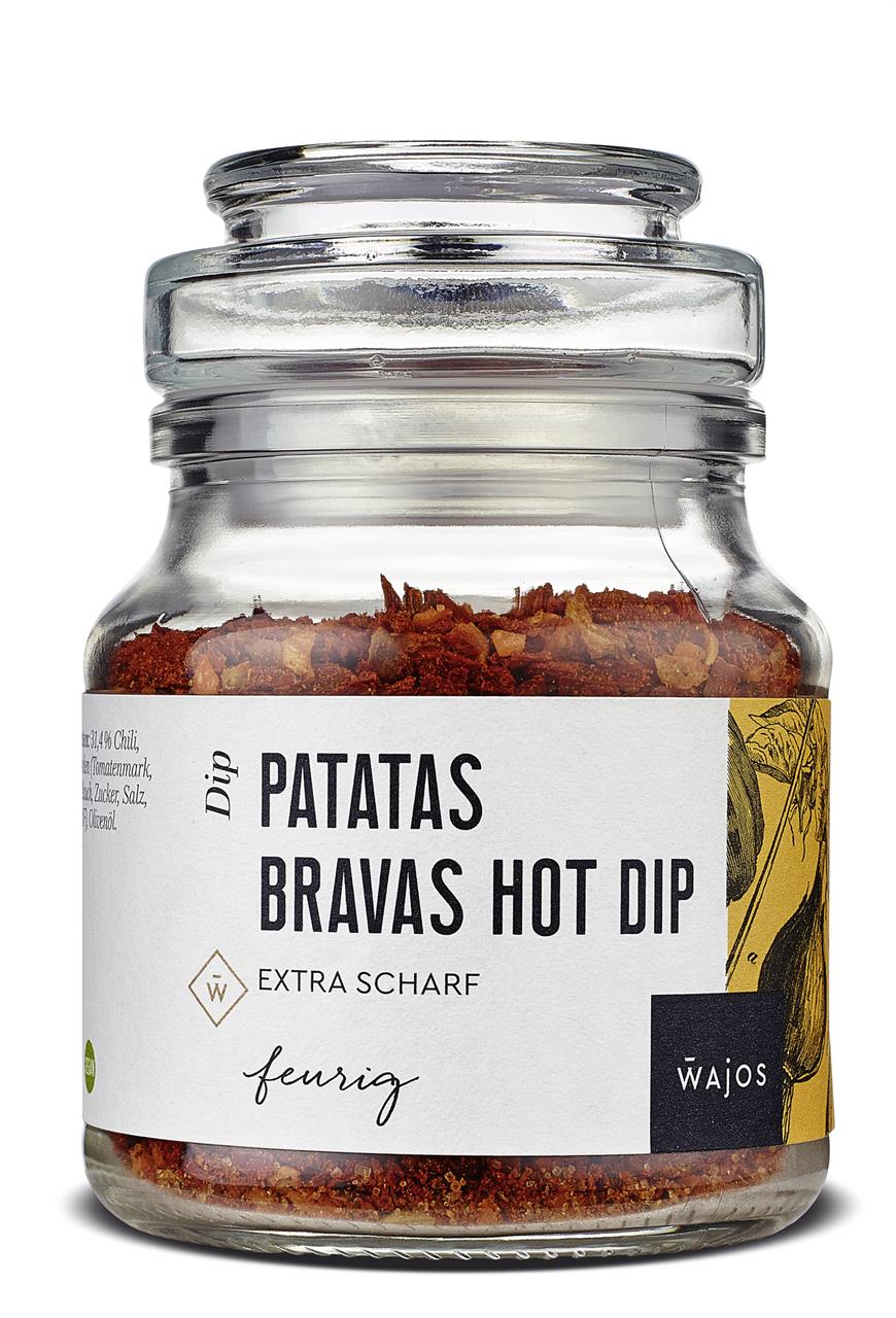 Das Bild zeigt ein Glas mit der Gewürzmischung "Patatas Bravas Hot Dip - extra scharf" von Wajos. Die Mischung ist feurig und besonders scharf, ideal als Dip für Patatas Bravas.