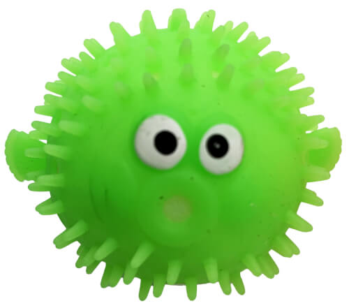 Das Bild zeigt einen grünen, stacheligen Ball mit zwei großen, weißen Augen. Der Ball sieht lustig und wie ein Cartoon-Tier aus.