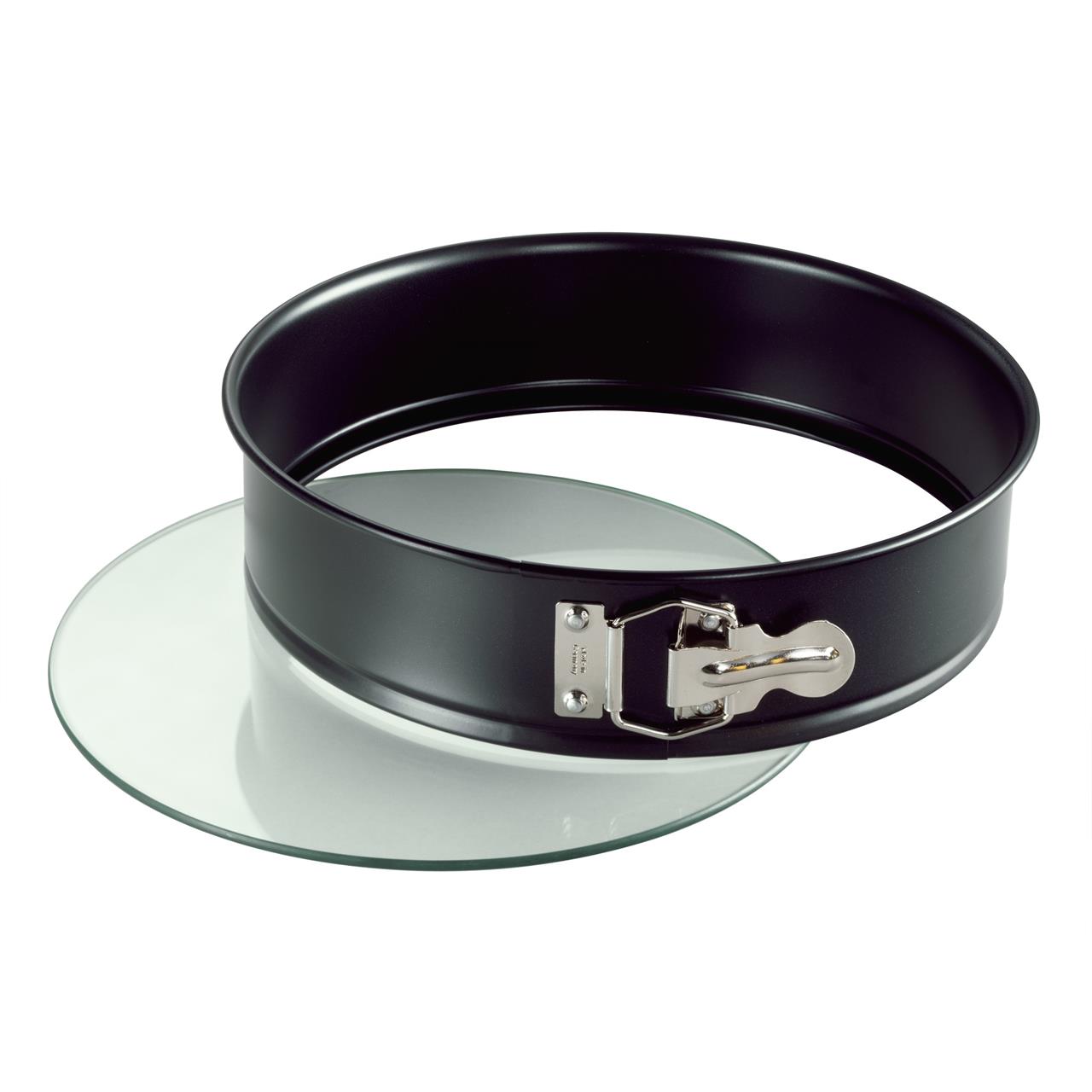 Das Bild zeigt eine Springform mit Glasboden und einem Durchmesser von 28 cm. Die Form besteht aus einem schwarzen Metallrand und einem herausnehmbaren Glasboden.