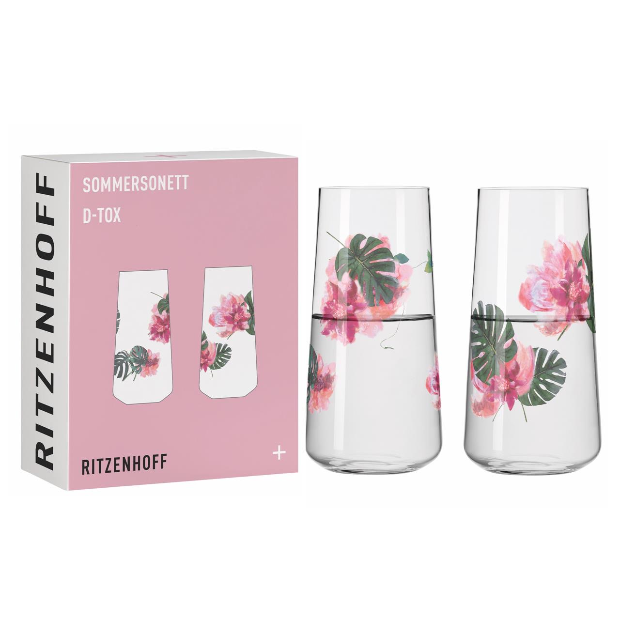 Das Bild zeigt ein Set aus zwei Wassergläsern mit floralen Motiven. Die Verpackung ist rosa und trägt die Aufschrift "SOMMERSONETT D-TOX" von Ritzenhoff.