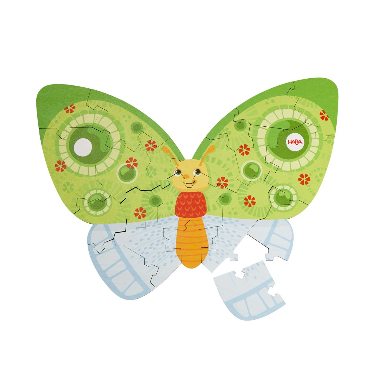 Das Bild zeigt ein buntes Puzzle in Form eines Schmetterlings. Einige Puzzleteile im unteren rechten Flügel fehlen noch.