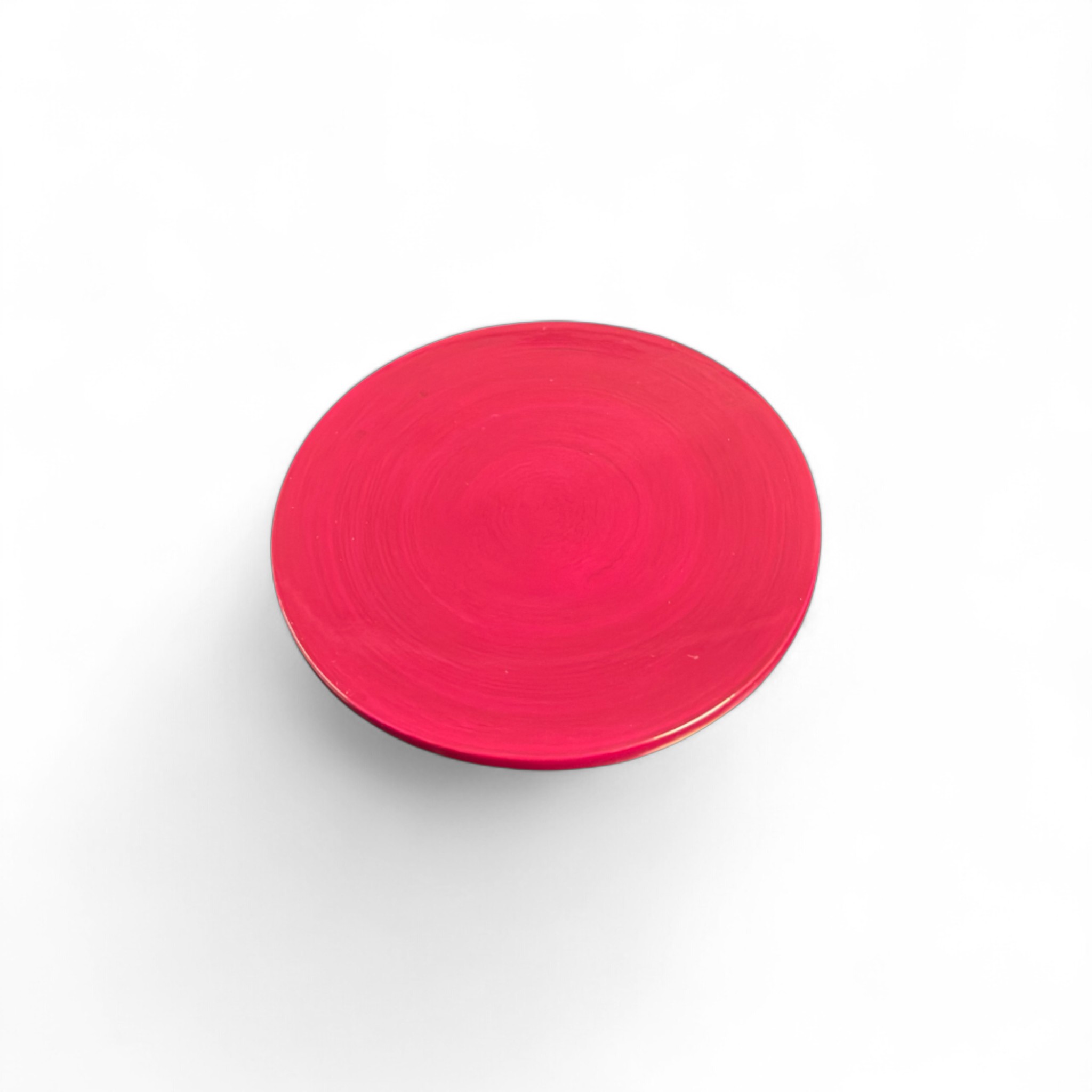 Bambus-Untersetzer mit einem Durchmesser von 10,5 cm in Fuchsia. Ideal zum Schutz von Oberflächen und als Farbakzent.