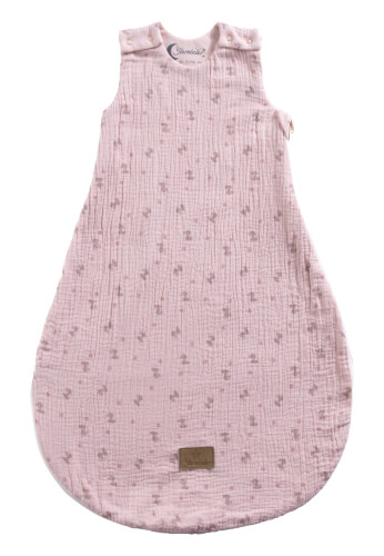 Auf dem Bild ist ein rosa Schlafsack mit kleinen Punkten zu sehen. Er hat breite Träger und einen weiten, unten abgerundeten Schnitt.