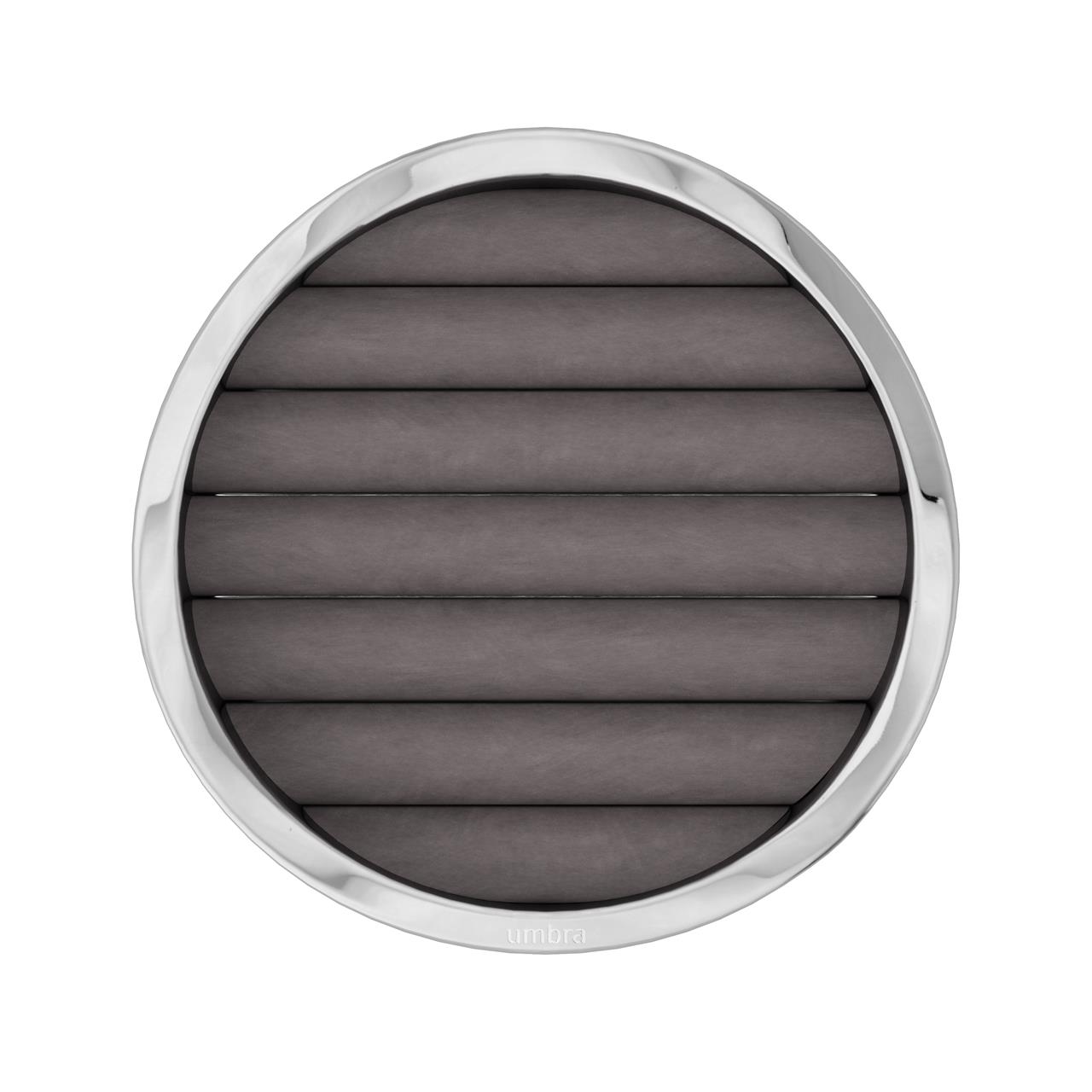 Dieses Bild zeigt einen runden Schmuck-Organizer mit einem wellenförmigen Einsatz und einem glänzenden Chromrahmen. Der Organizer eignet sich ideal zur Aufbewahrung von Ringen und Ohrringen.