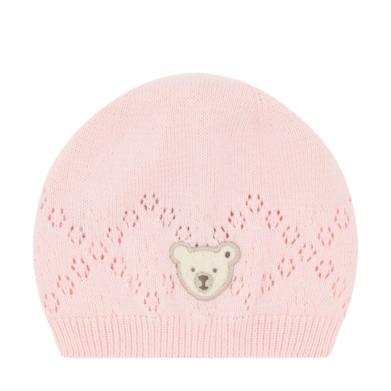 Die Abbildung zeigt eine rosa Strickmütze mit einem Bärchenaufnäher vorne. Das Produkt heißt „Mütze Ballerina Gr.47“.