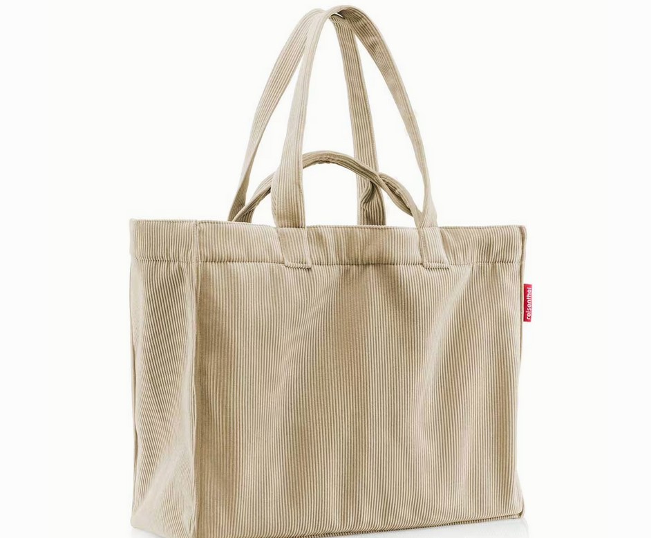 Dies ist die Softshopper Cord Sand Tasche. Die Tasche hat ein sandfarbenes Cord-Design.
