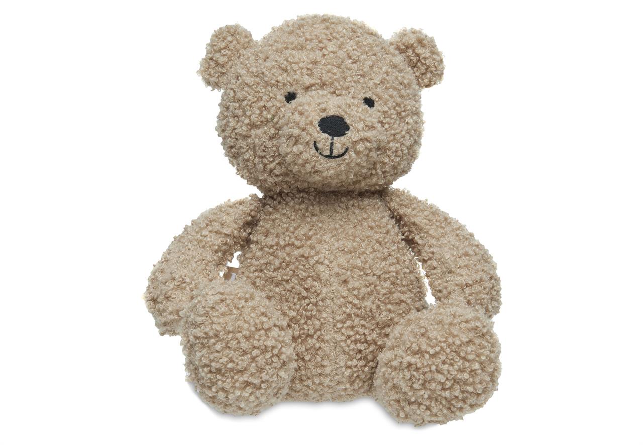 Dies ist ein weiches Kuscheltier in Form eines Teddybären namens "Biscuit". Der Teddybär hat lockiges, beige-braunes Fell und ein freundliches Gesicht.
