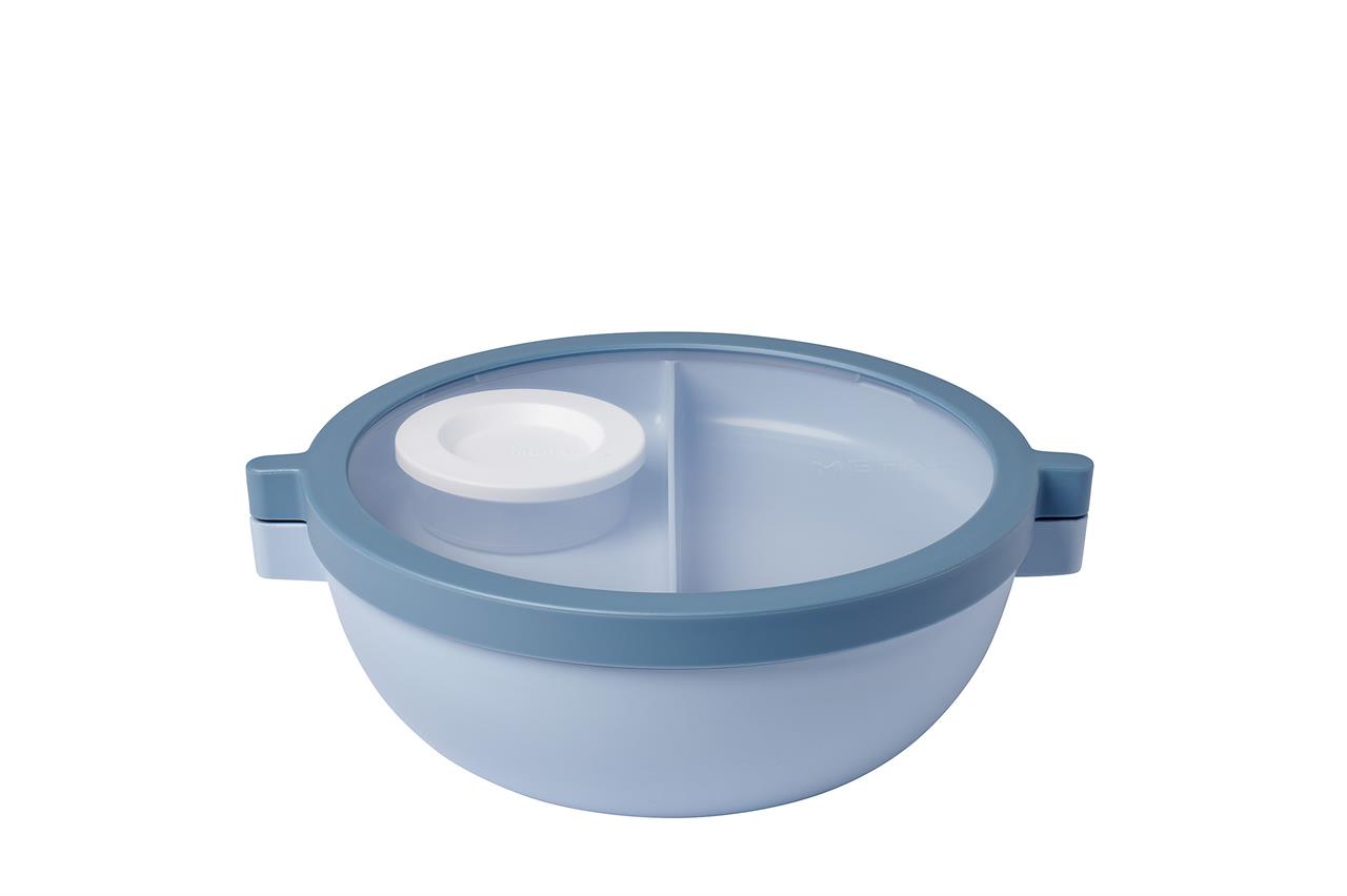 Dies ist eine Bento Lunchbowl Vita in der Farbe Nordic Blue. Die Schüssel hat eine runde Form mit zwei Fächern und einem kleinen weißen Behälter im Inneren.