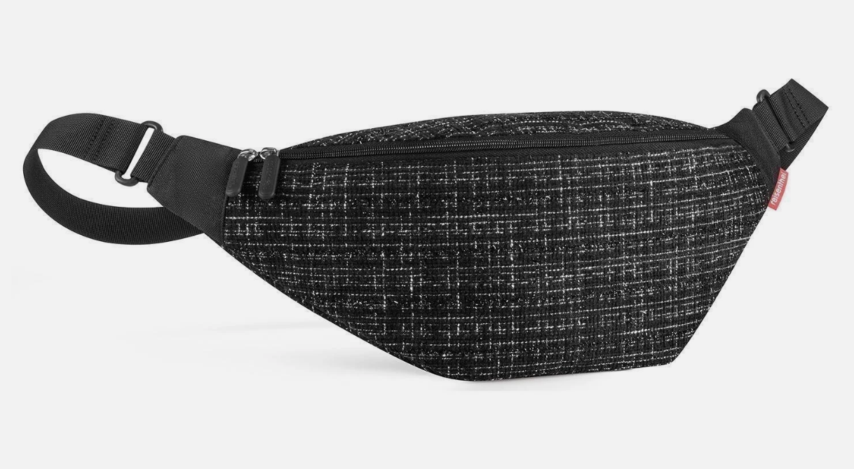 Die Abbildung zeigt eine city beltbag bouclé black. Diese Gürteltasche ist in elegantem Schwarz gehalten.