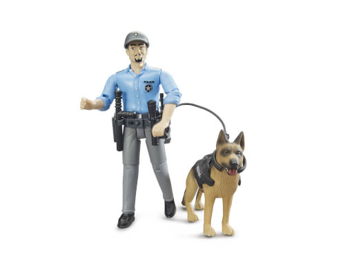Auf dem Bild ist eine Spielfigur eines Polizisten mit einer Polizeiuniform zu sehen. Neben ihm steht ein Polizeihund an der Leine.