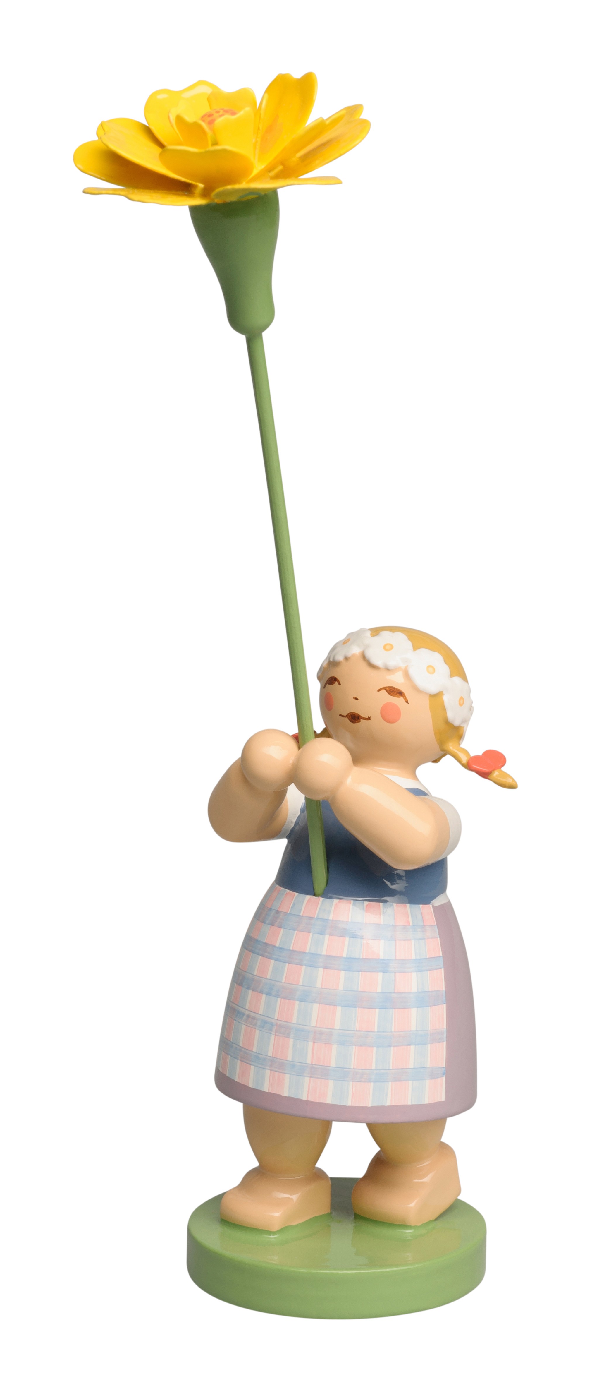 Das Bild zeigt ein Mädchen mit einer Studentenblume. Das Mädchen hält oder betrachtet die Blume.