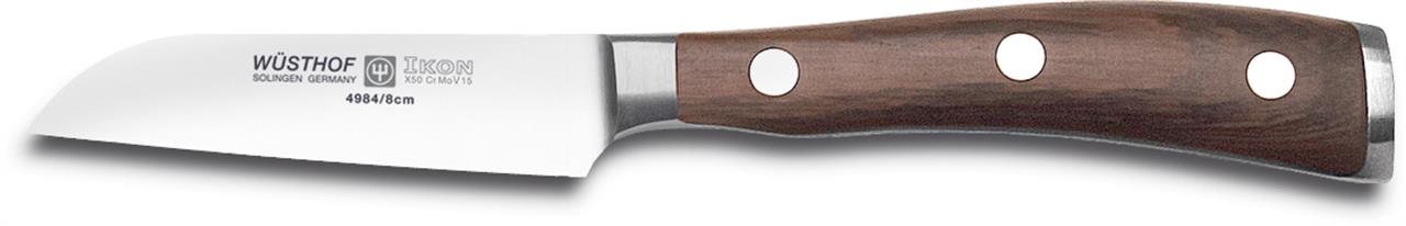 Das Bild zeigt ein Gemüsemesser mit einer 8 cm langen Klinge aus der Ikon-Serie von Wüsthof. Das Messer hat einen ergonomisch geformten Griff aus dunklem Holz mit drei Nieten.