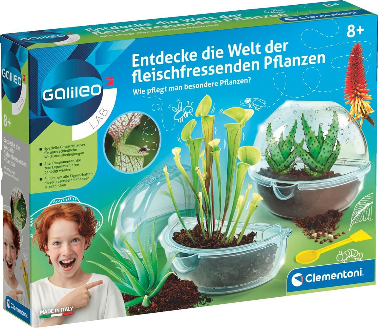 Auf dem Bild ist ein Experimentierkasten mit dem Titel "Entdecke die Welt der fleischfressenden Pflanzen" zu sehen. Die Verpackung zeigt verschiedene Pflanzen und einen begeisterten Jungen.