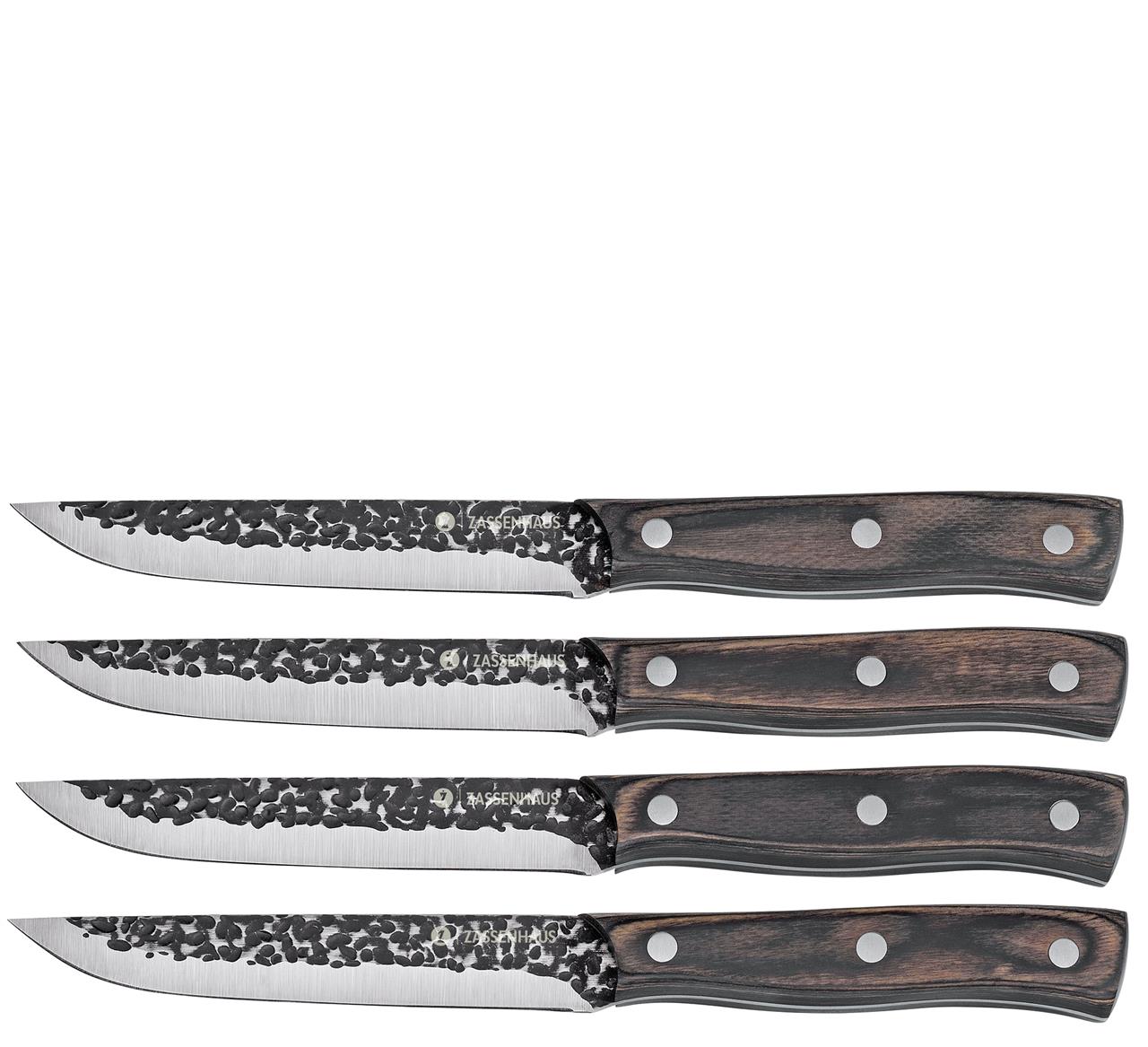 Das Bild zeigt vier Steakmesser mit dunklen Holzgriffen und gehämmerten Klingen. Es handelt sich um das Produkt "Steakmesser Hunter 4er-Set".