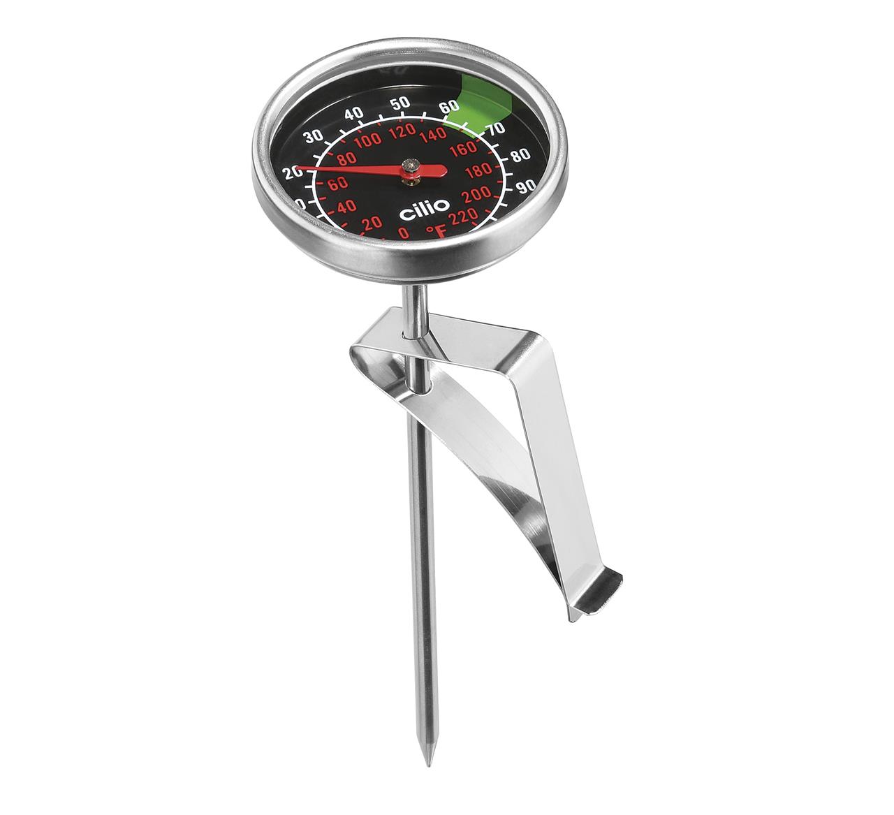 Das Bild zeigt ein Milchthermometer aus Metall mit einer analogen Anzeige. Es hat eine Klemme, um es an einem Behälter zu befestigen.