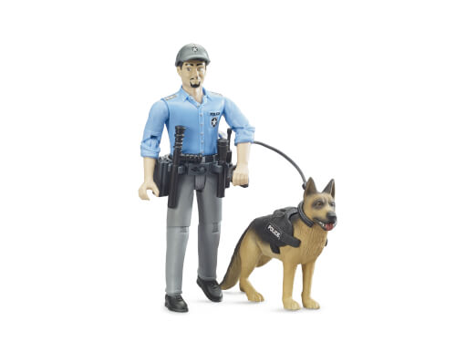 Auf dem Bild ist eine Spielfigur eines Polizisten mit einer Polizeiuniform zu sehen. Neben ihm steht ein Polizeihund an der Leine.
