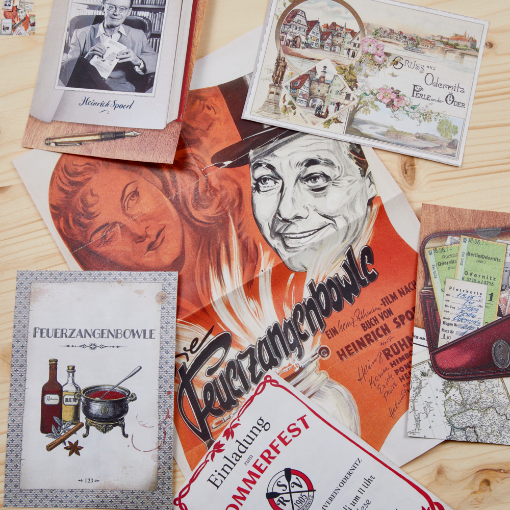 Hier wird eine Seite aus der Schmuckausgabe 'H. Spoerl, Die Feuer' gezeigt. Die hochwertige Buchgestaltung setzt besondere Akzente.